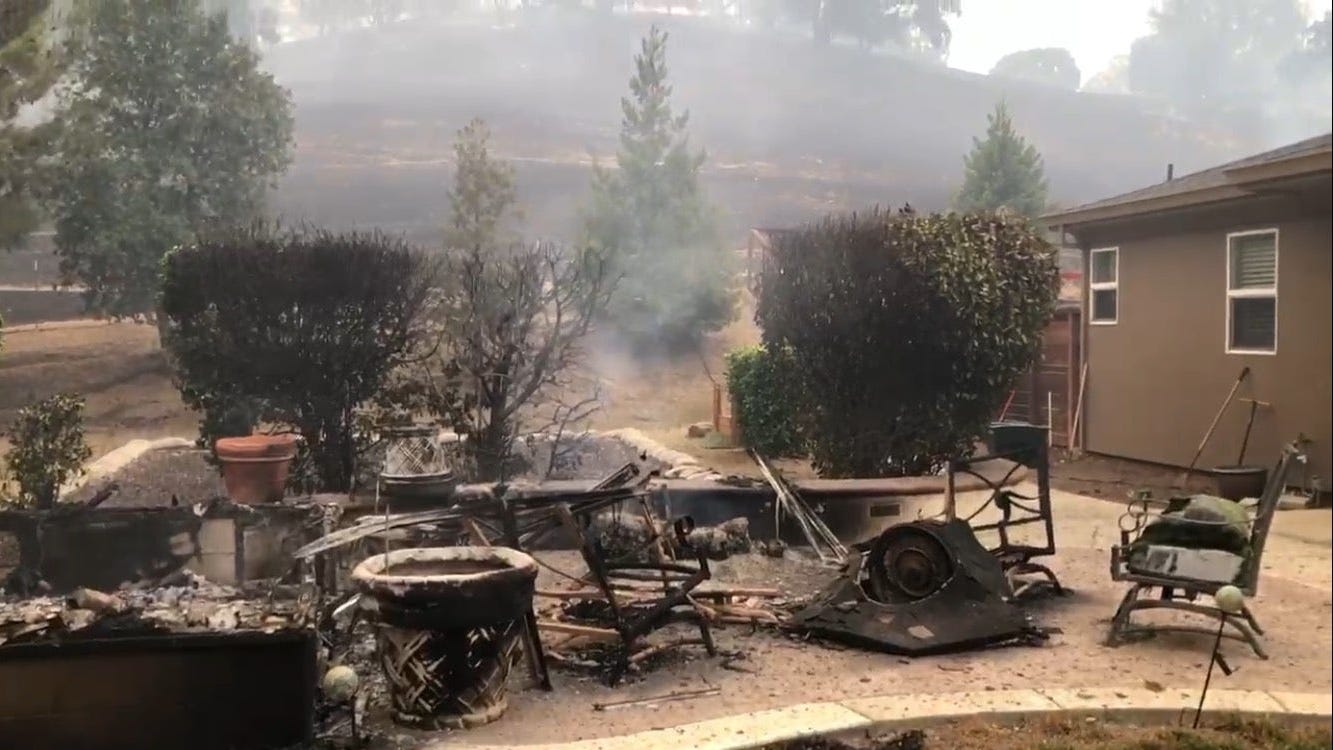 VIDEO: Evacuated Bay Area Couple Returns to Find Their Home Still Standing Amid Torched Land