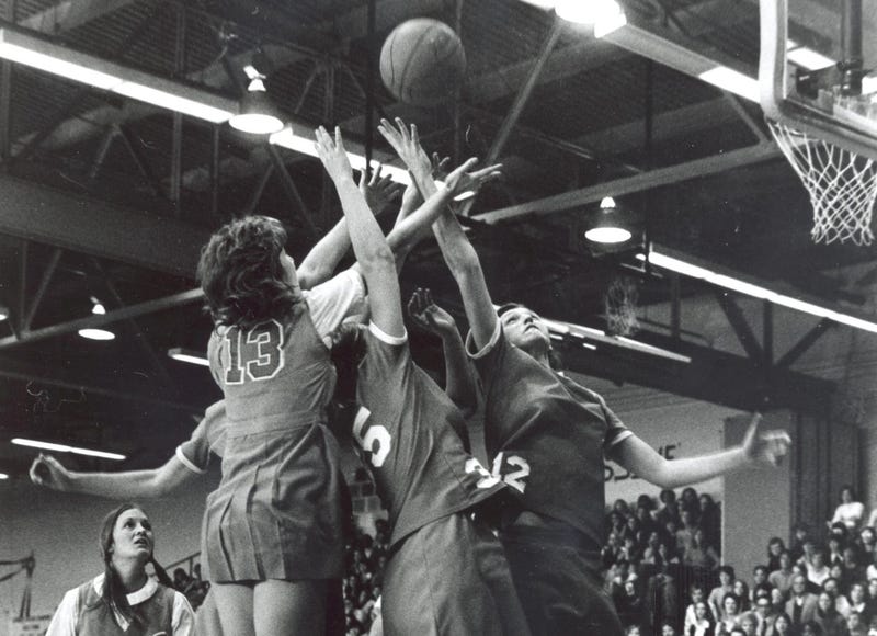 Theresa Shank Grentz (right, #12) on the court for Immaculata University.
