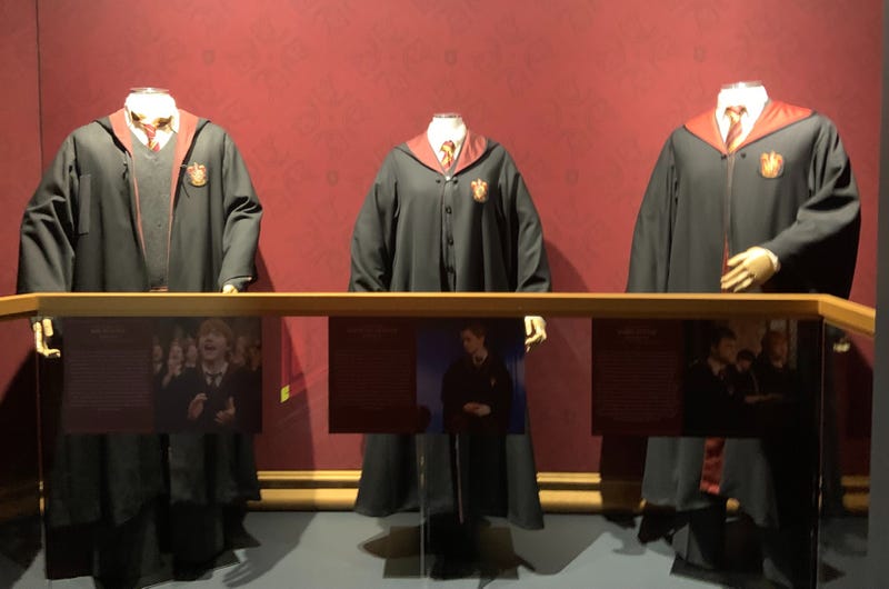 Gryffindor class are robes on display at the Franklin Institute's "Harry Potter: The Exhibition."