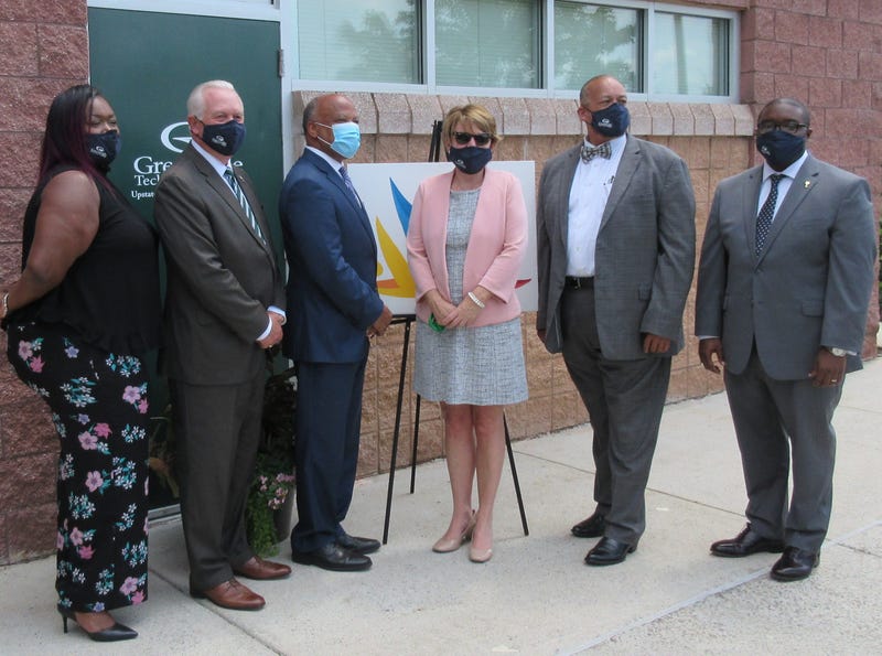 Senator Karl Allen (third from left) with (left to right) Stephanie Sherman, Dr. Keith Miller, Jennifer Moorefield, Sammie Stroud, and Dr. Jermaine Whirl of Greenville Technical College at the opening of the GTC Returning Citizens Program at the Phillis W