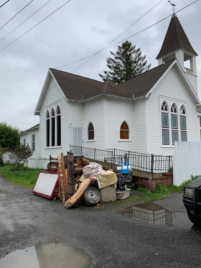 Items ruined by recent flooding of the Russian River are piling up around Guerneville.