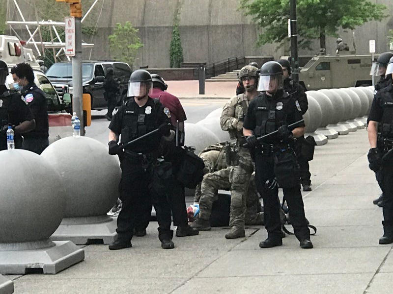 Martin Gugino on sidewalk in Niagara Square