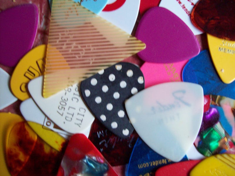 colorful guitar picks scattered