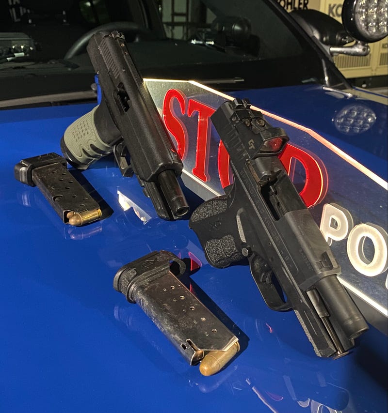 guns seized during traffic stop
