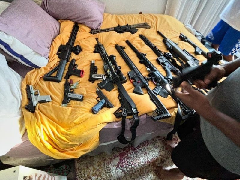 Photo of rifles as part of the evidence provided in indictments charging over a dozen people in a series of East Harlem gang shootings.