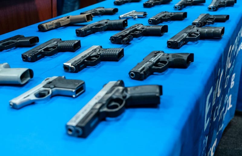 seized guns on a table