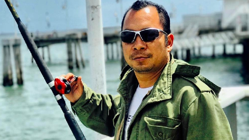 Undated photo shared by family of Gustavo Martinez showing him fishing. The father was shot and killed Jan. 22 at a bar in South Gate.