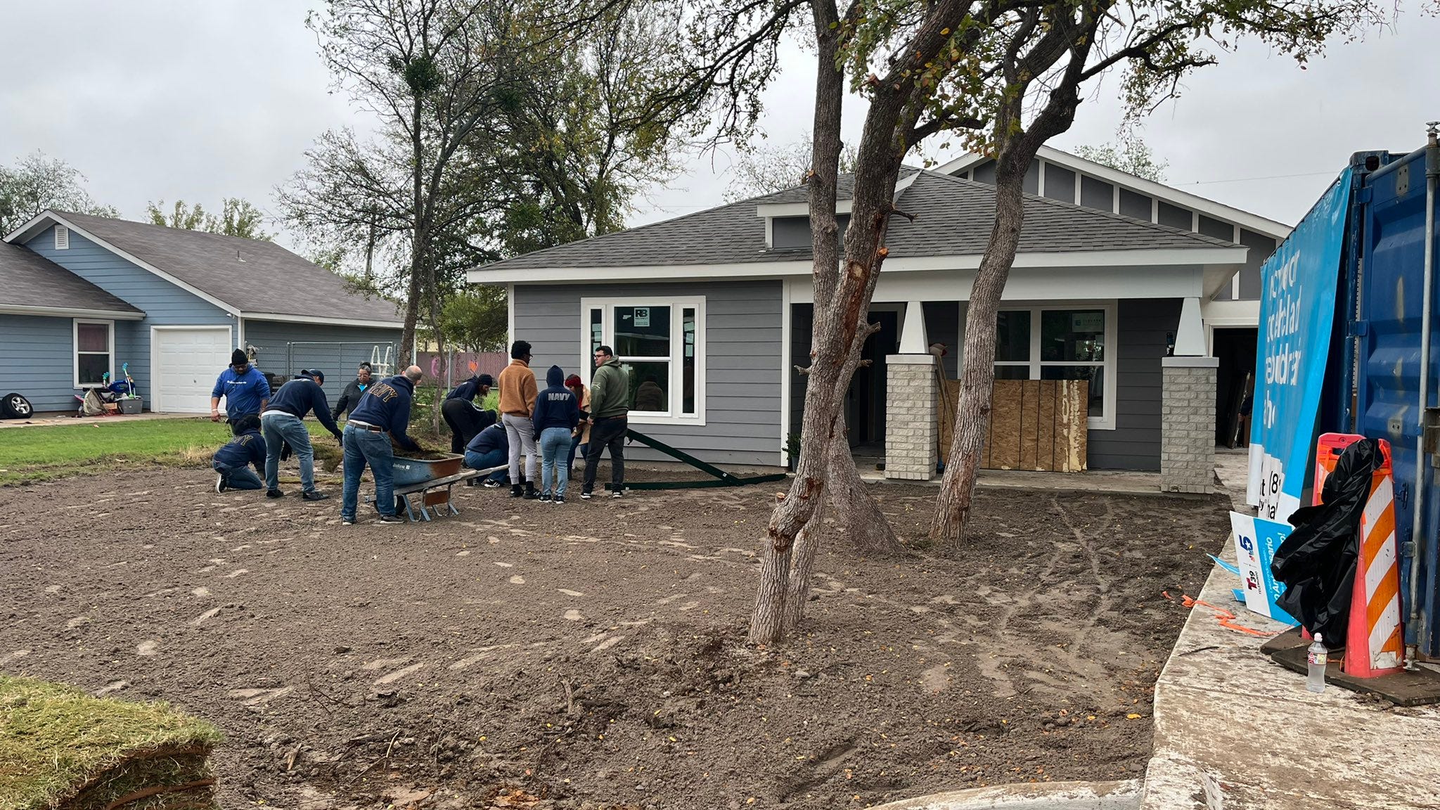 Navy Reservists work at Habitat for Humanity house for Fort Worth veteran