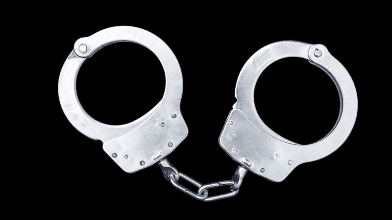 Handcuffs - stock photo