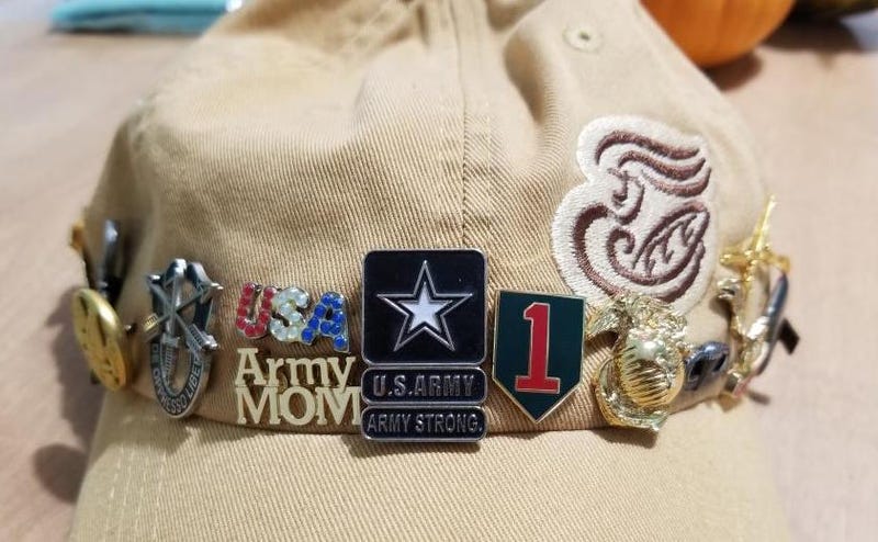 Her latest three pins included one that said Army Mom, because her son is now in the service.