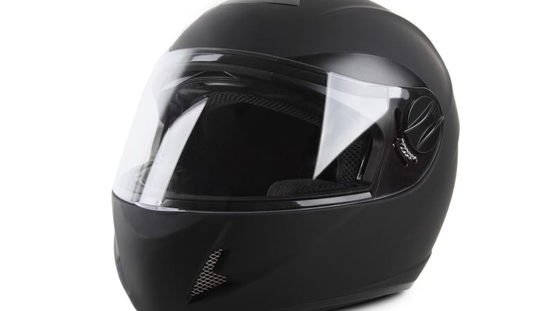 Black motorcycle helmet isolated - stock photo