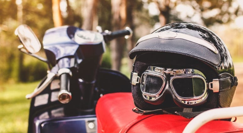 helmet on seat of motorcycle