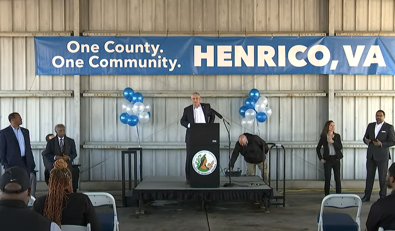 County Manager John Vithoulkas on a podium, addressing County employees