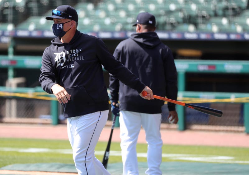 A.J. Hinch does some infield work with the Tigers