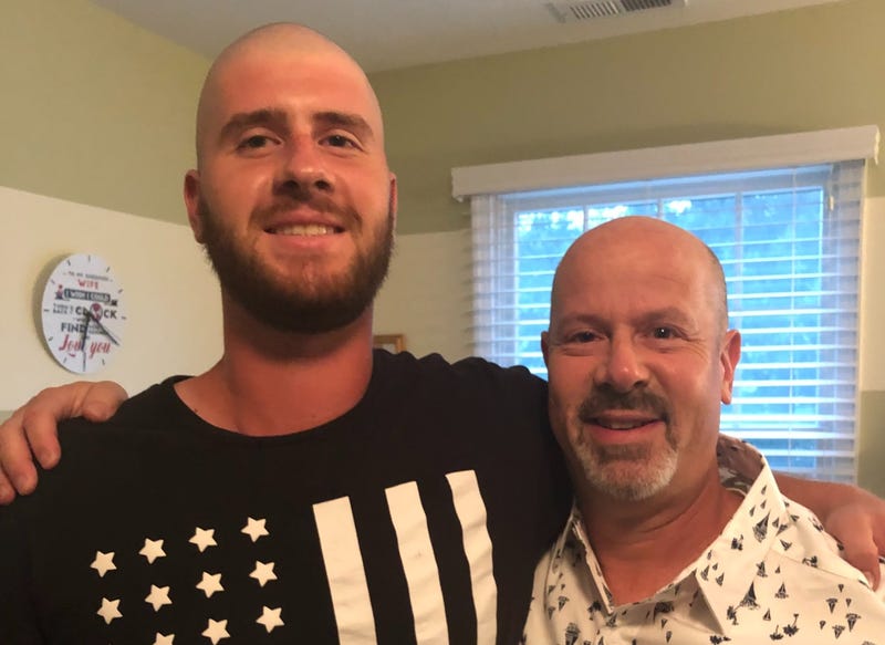 Brendan Hirsh (left) and his father Steve