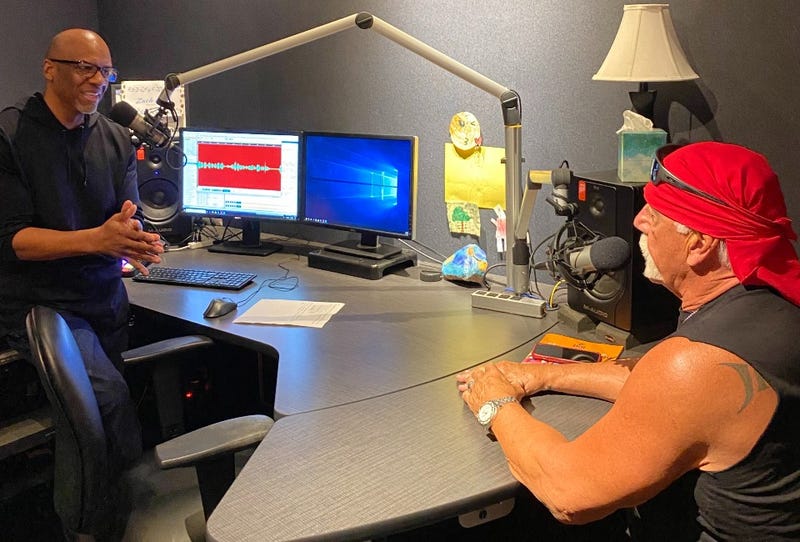 Hulk Hogan poses for a photo with WWJ's Tony Ortiz at the Audacy Detroit studios in Southfield on July 24, 2024.