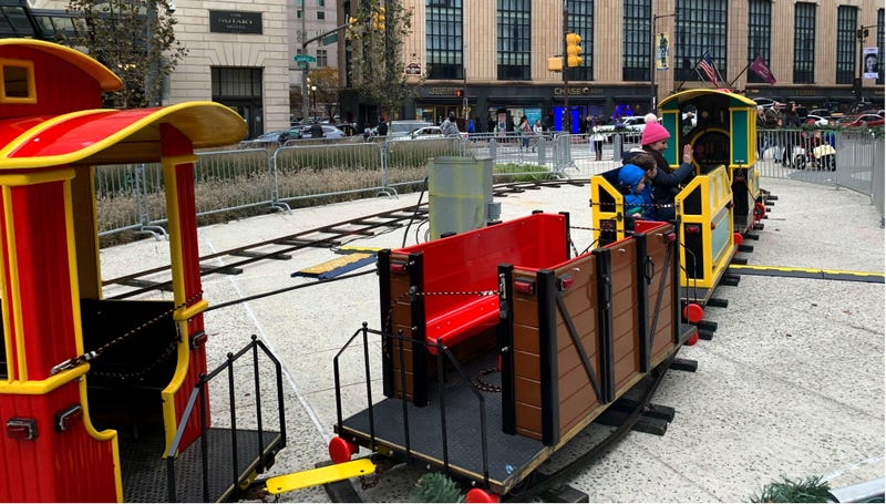 Holiday market visitors enjoying the new train.
