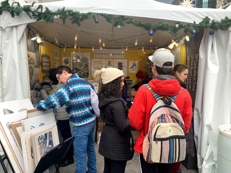 Shoppers at the pop-up holiday markets in Center City.