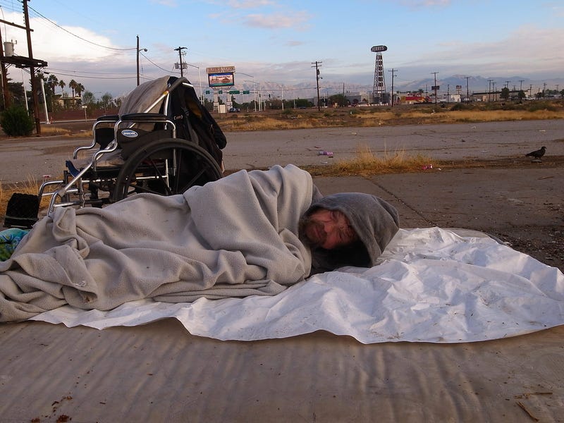 Homeless man sleeping on Las Vegas Boulevard North