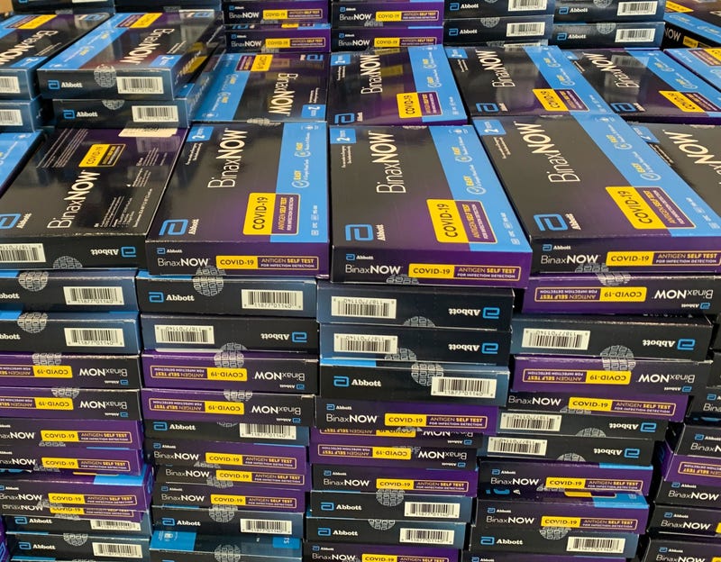 Stack of rapid home antigen tests for COVID-19