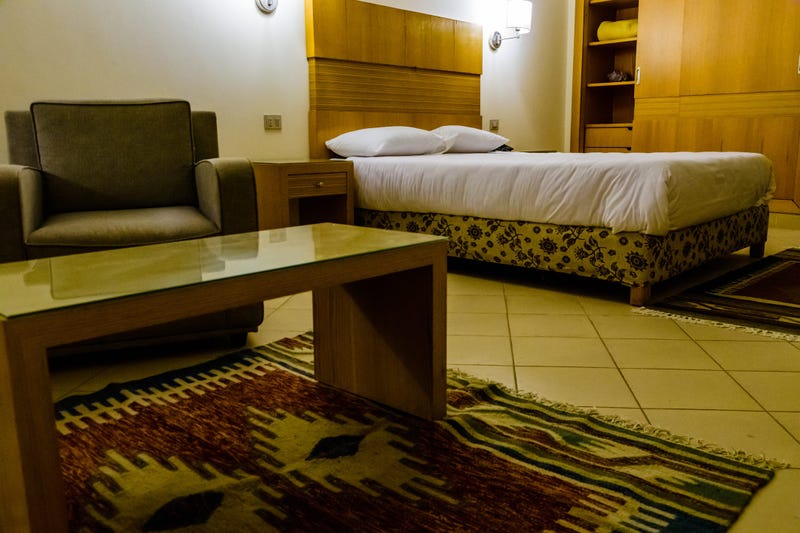 hotel room bed and chair