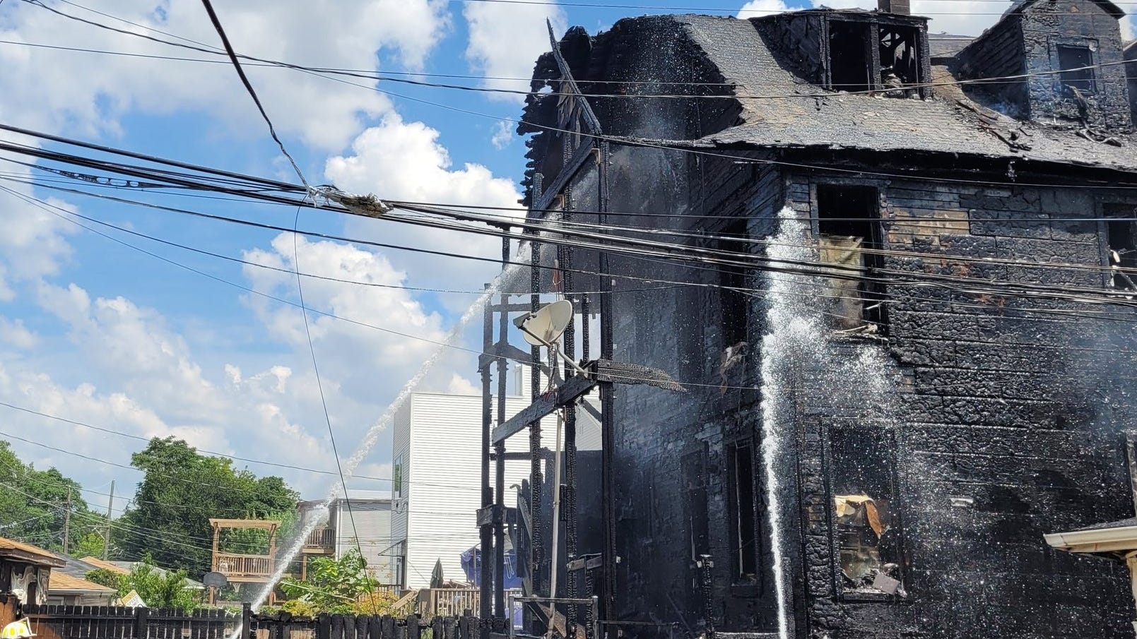 Two firefighters hurt while battling Humboldt Park house fire, CFD says