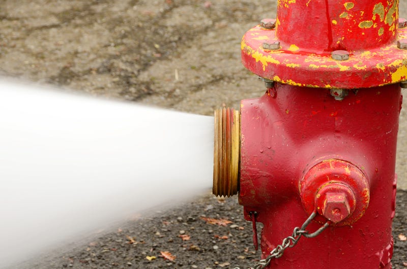 water gushing from fire hydrant
