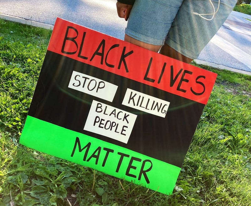 Organizers of a march through the streets of Hyde Park say it was meant to start dialogue about racism, not conflict.