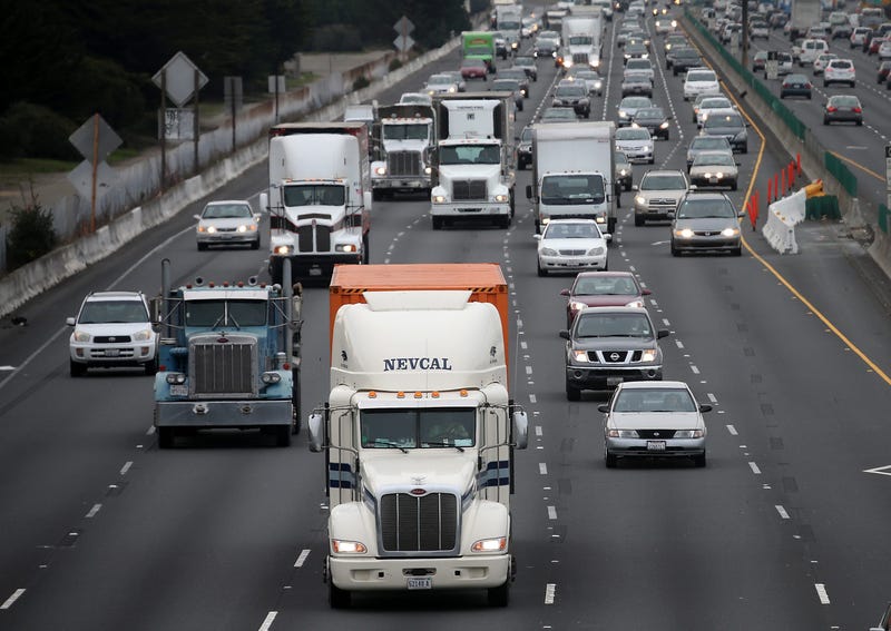 Trucks drive along Interstate 80 on February 18, 2014 in Berkeley, California.