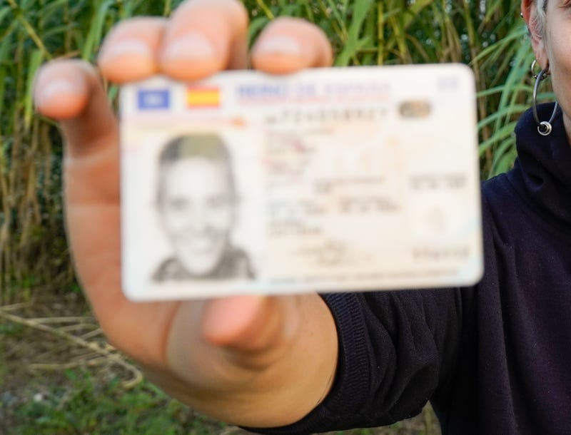photo ID being held up