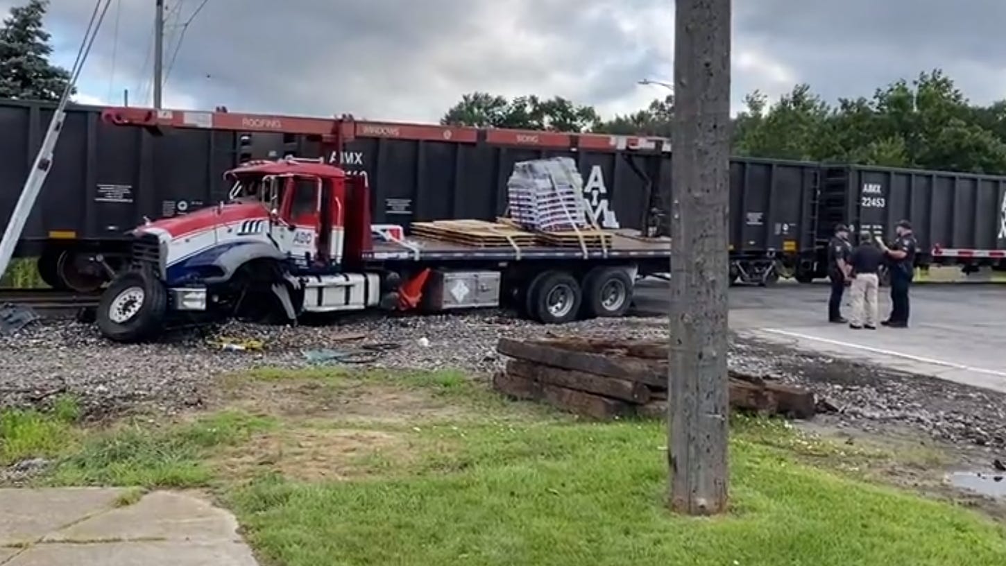 'It's never good to try and beat the train': Police believe truck driver involved in Downriver train crash drove through warning signs