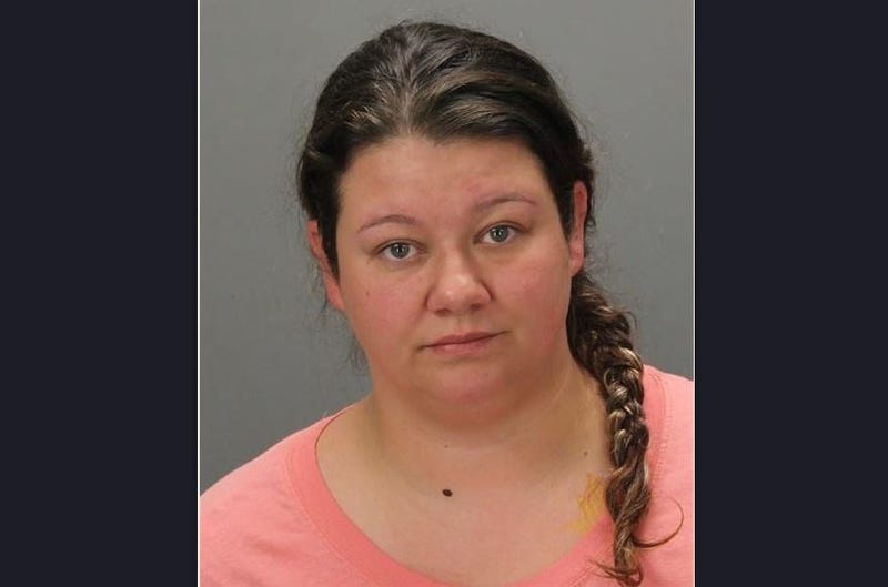 Brittany Ann McClure, 30, was arraigned on one count of sodomy with a dog named Max and another count of cruelty to an animal.