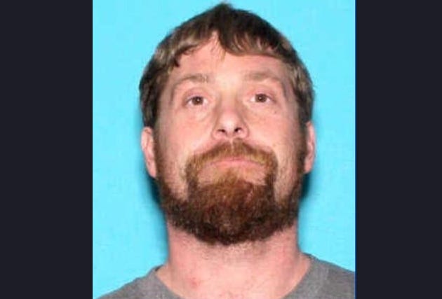 A homeless man was charged with multiple felonies in the shooting death of a 44-year-old Redford man and his cat at a rural cottage in Tuscola County one week ago, authorities announced.