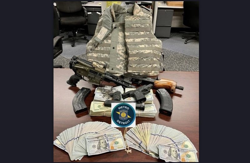 A large quantity of drugs, stolen guns, ammo and more were taken off the street after a state trooper conducting a traffic stop in Detroit discovered the criminal activity, authorities said.