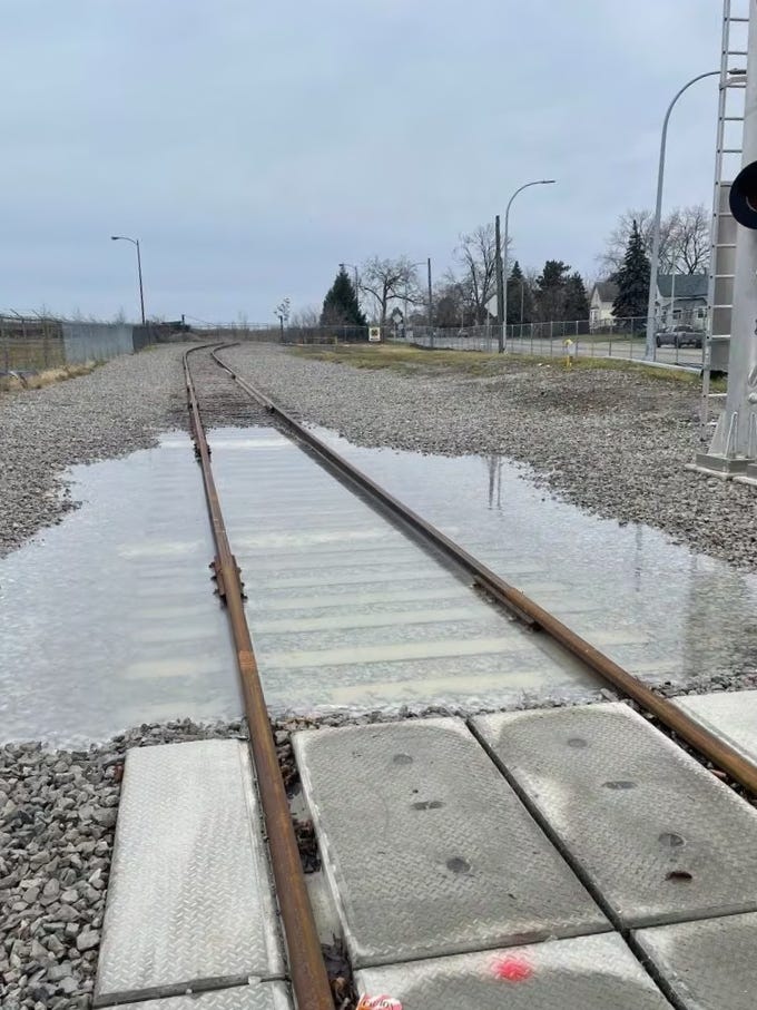 Pool of ‘corrosive milky liquid’ that may cause chemical burns discovered around Downriver railroad tracks