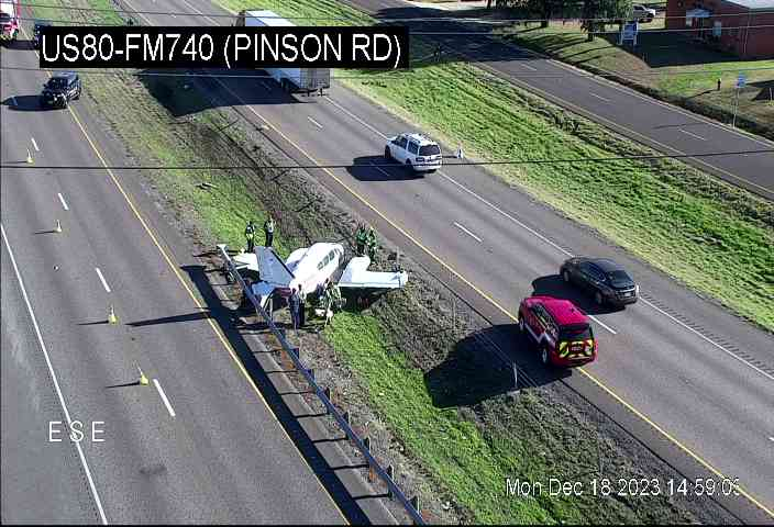 A small plane landed on the median of U.S. Highway 80 in Forney, Texas on Monday, Dec. 18, 2023.