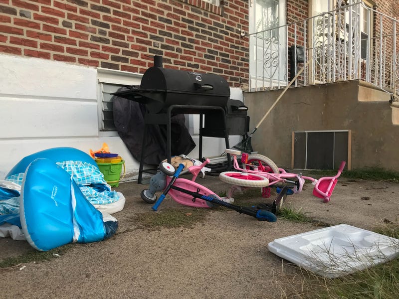 The Tacony home where a woman is alleged to have killed her husband and two daughters before turning the gun on herself. 