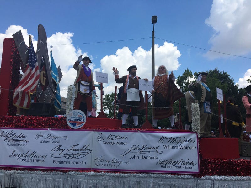 A float featuring the nation's founders is in the 2019 Independence Day Parade.