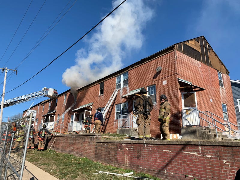 Montgomery County firefighters take part in a rare live fire training session at an eight-home complex in Upper Dublin scheduled for demolition.