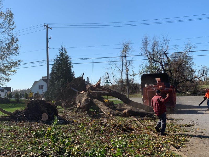 People pitching in to help clear trees uprooted by the EF2 tornado that struck a Glen Mills development on Halloween.