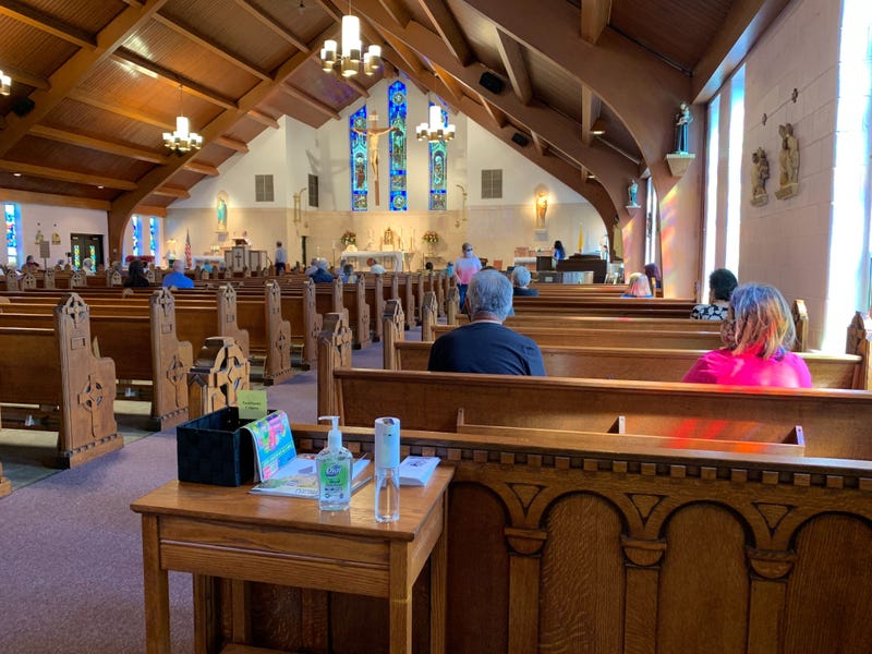 Hand sanitizer is made available for socially distanced parishioners at Saint Anselm Church in the Parkwood section of Northeast Philadelphia.