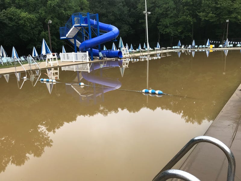 The Springfield Swim Club is a muddy mess this morning. The Darby Creek flooded yesterday and this place was underwater.