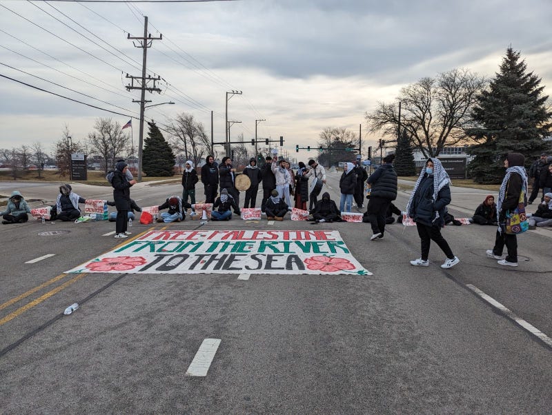 Protesters shut down the entrance to a missile component manufacturer in suburban Niles on Wednesday morning. 