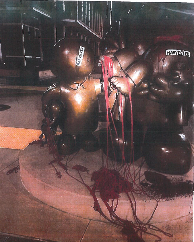 The vandalized bronze statue of the Madonna and Child.