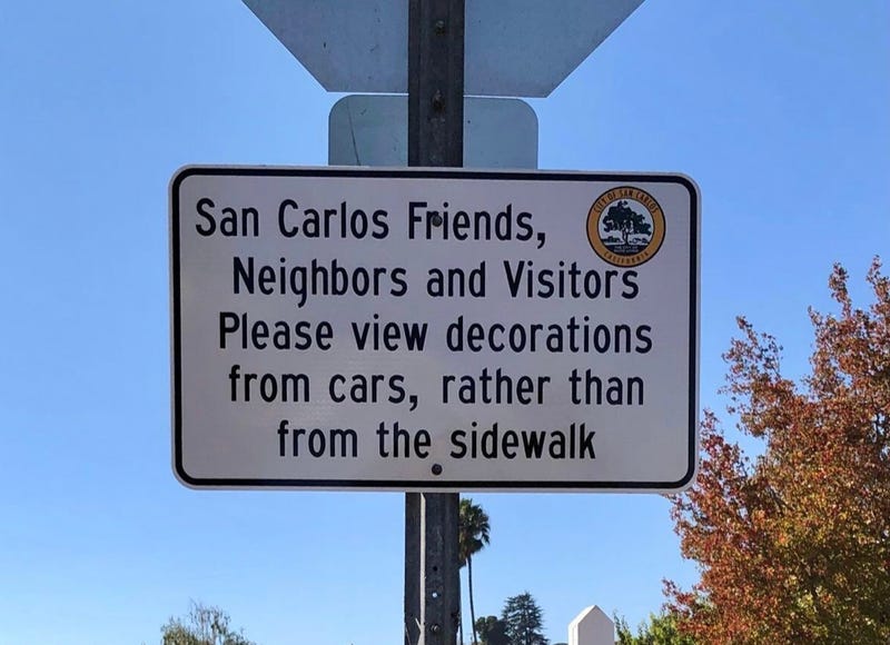 Sign on Eucalyptus Avenue in San Carlos asking holiday lights observers to stay in their cars