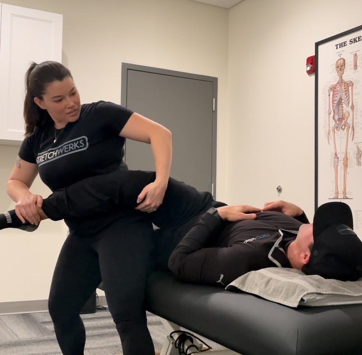 StretchWerks therapist demonstrating a stretch