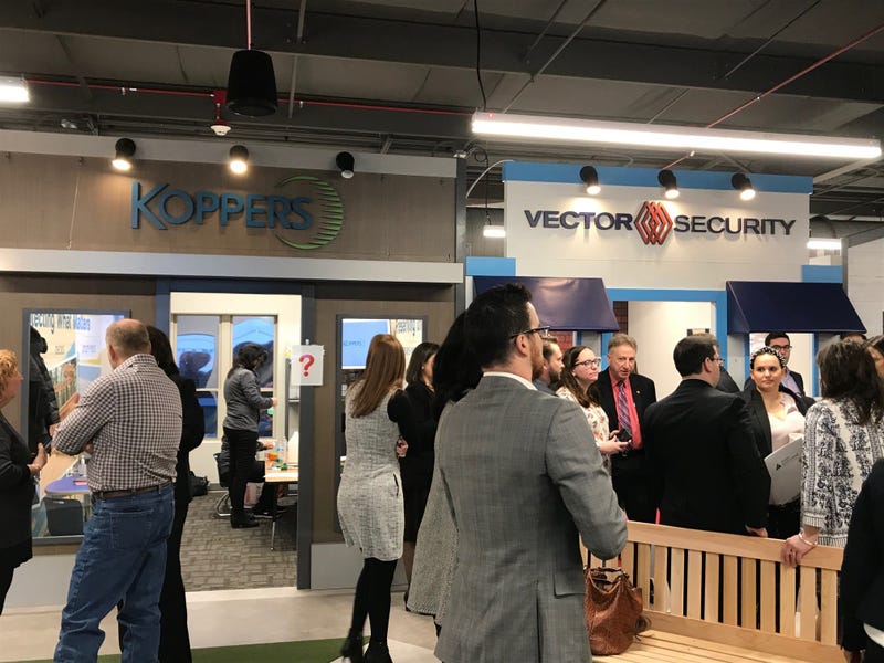 Outside shots of Koppers' and Vector Security's storefronts