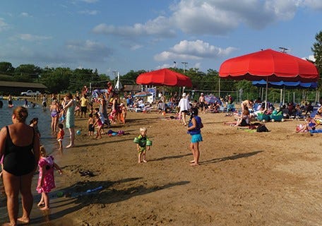 Residents enjoy the beach at Mundelein's Diamond Lake Recreation, Beach and Boat Launch.