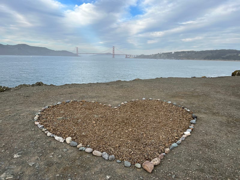 A heart overlooks the San Francisco Bay and Golden Gate Bridge at Lands End.