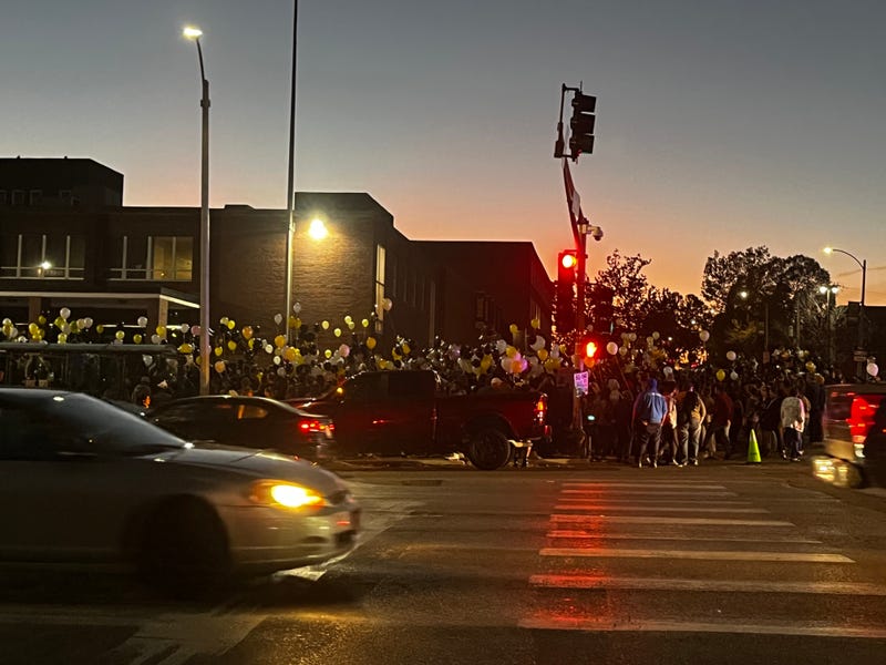 people gathered around CVPA with balloons
